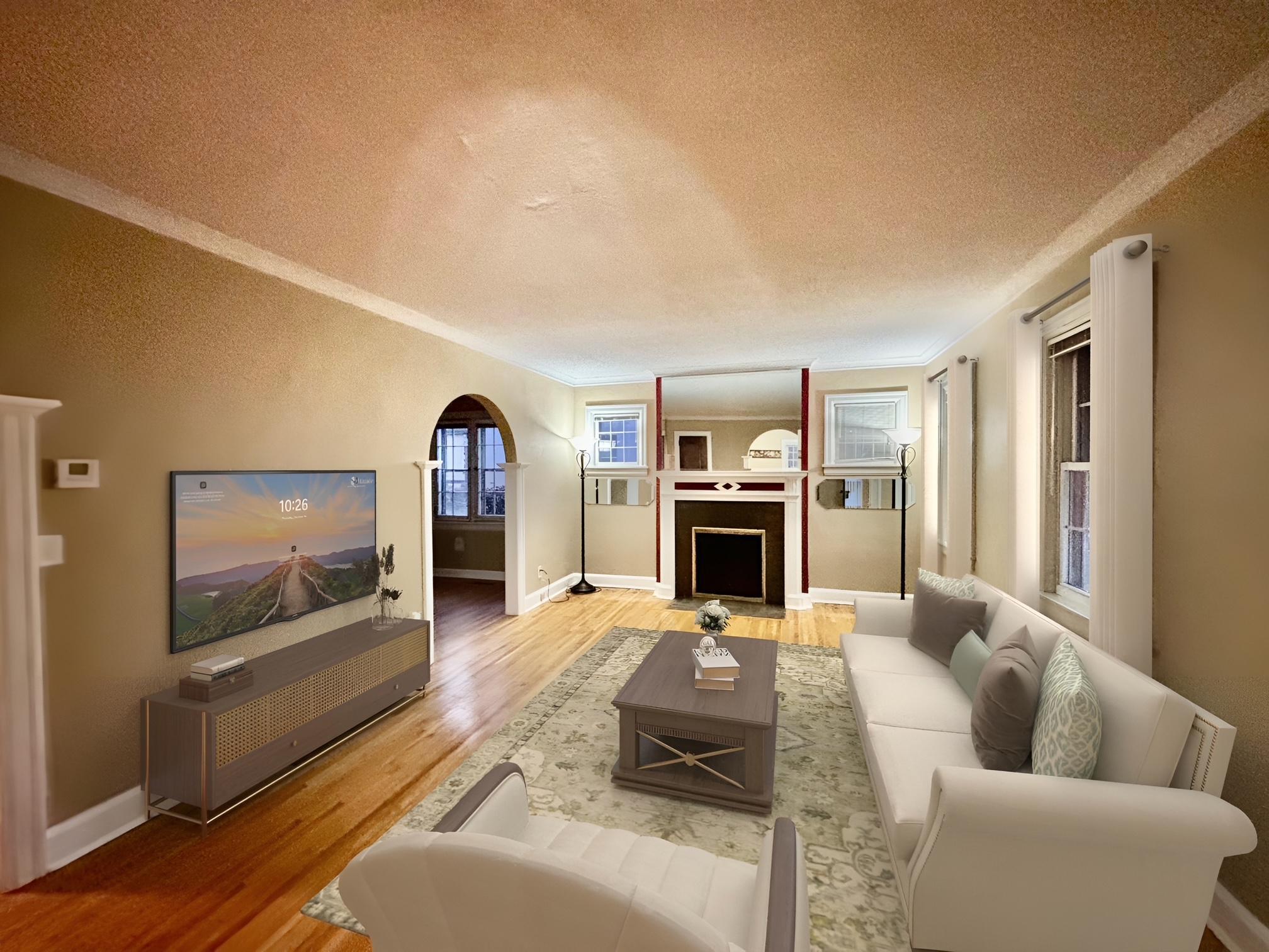 Spacious living room, hardwood floors!