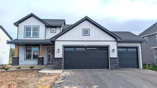 Welcome to 7971 Upper 41st St N! (Photo is of the actual home in progress.)