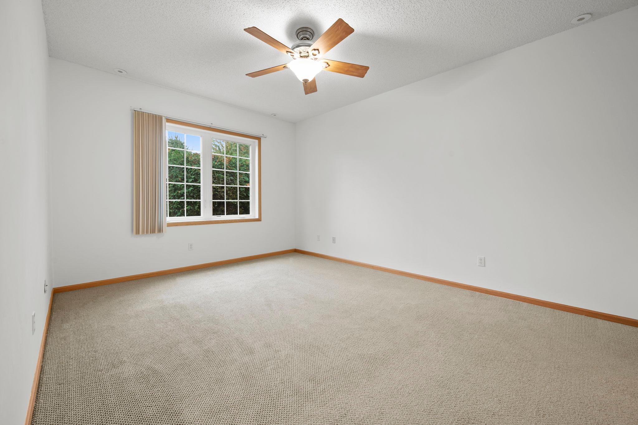 The spacious primary suite includes a walk-in closet and private bath. The home has 36" wide doors throughout for accessibility should it be needed.