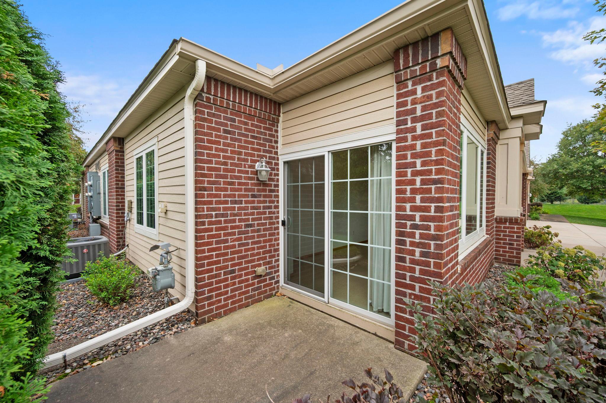 A low-maintenance patio offers a comfortable outdoor space for relaxing or entertaining.
