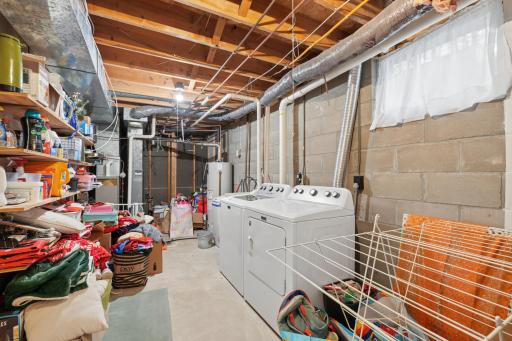 Laundry and utility room has plenty of room for storage.
