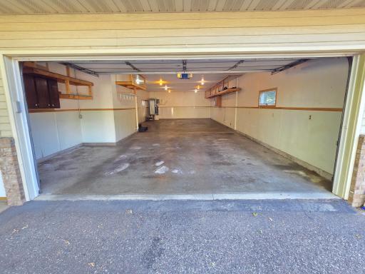 Super deep garage, and room on the sides to put some outdoor season equipment too.