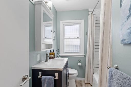 The bathroom has also been renovated with added storage and modern fixtures.