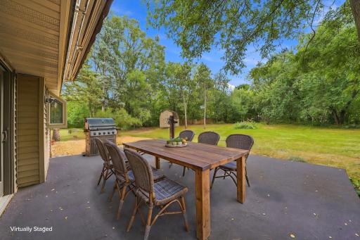 49- 10248 Washburn large deck with awning-virtually staged.jpeg
