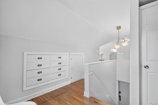 Built-in drawers provide convenient storage on the upper level.
