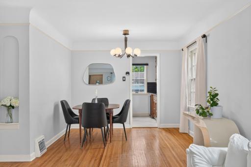 The dining room flows easily into the living room and kitchen for comfortable everyday living.