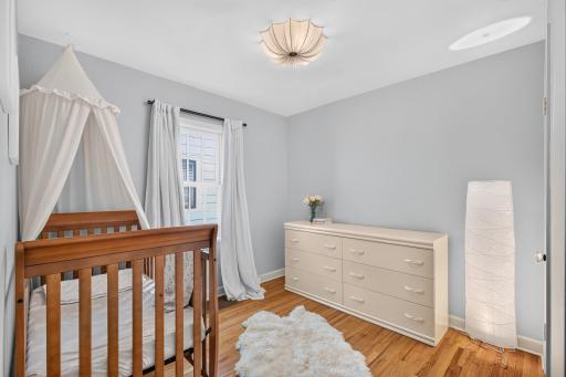 A second main-level bedroom provides a comfortable option for a nursery or office.