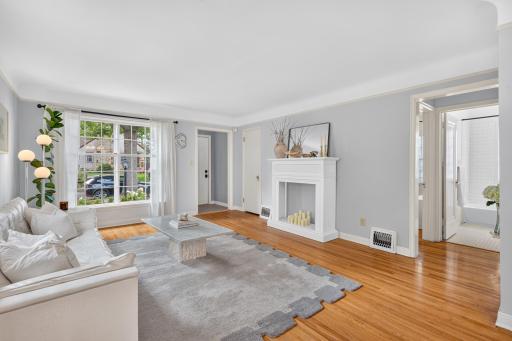 A welcoming living room where timeless character meets fresh, tasteful finishes.