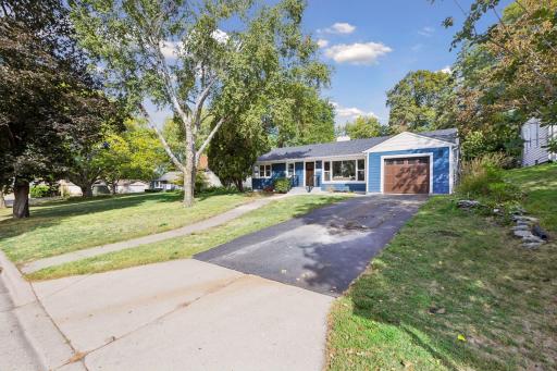 The home is situated on a large 10,000 square foot lot with no alley!