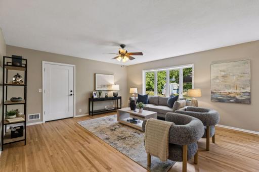 The family room features new hardwood floors to match the rest of the main floor.