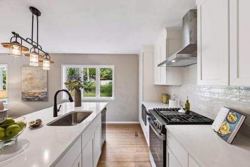 You can at the sink and get a full view of the backyard and family room.