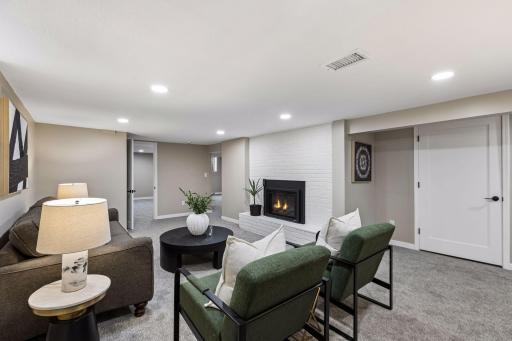 The lower level offers additional living space along with new gas fireplace.