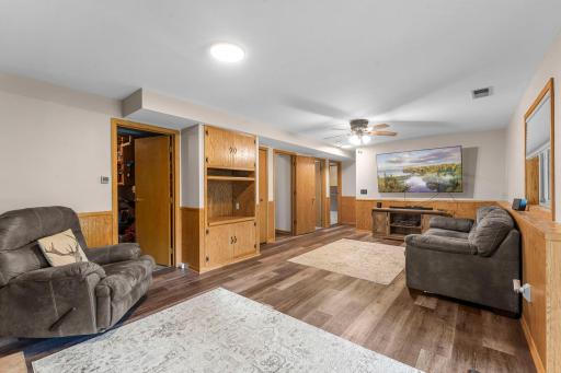 Lower level family room with view to bedroom hallway