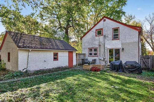 Spacious back yard, large garage for extra storage, partial fence, patio and grilling spaces!