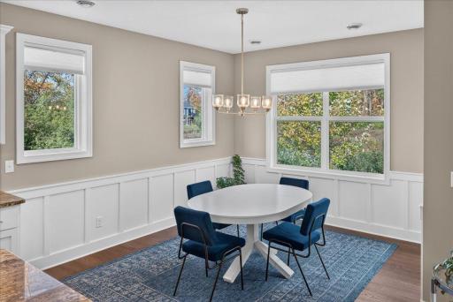 Custom wainscoting and natural light on 3 sides