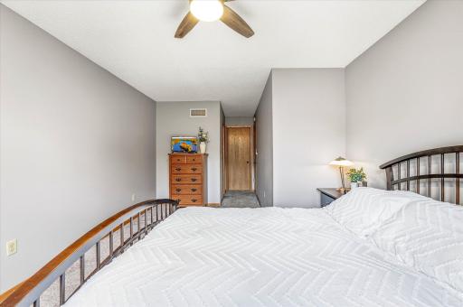 Primary bedroom has new ceiling fan w/remote.