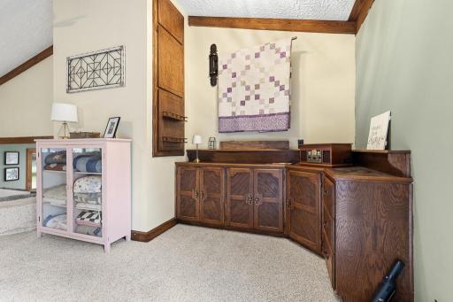 Built-in cabinets and storage - The perfect space for displays, decorations, or even a little entertainment bar.