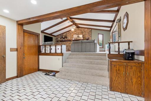 The tuckunder garage opens right up to the kitchen - great for unloading your groceries! - take a look at the natural woodwork and stunning beams.