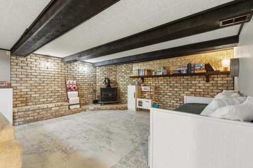 A lot of great options to use this space - great cozy movie room, game room, whatever suits your needs.