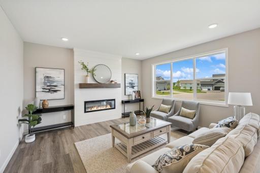 Living Room - photo is of a previous inventory home. Inquire for more details and options.
