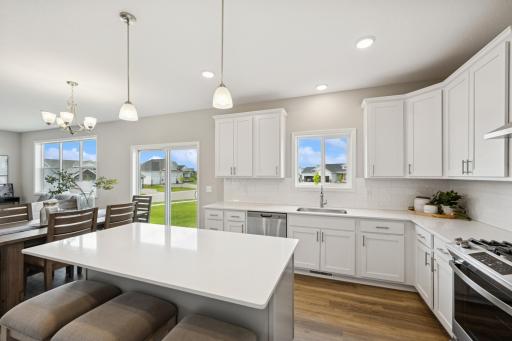 Kitchen - photo is of a previous inventory home. Inquire for more details and options.