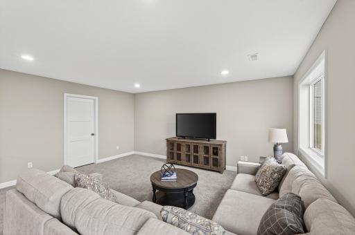 Finished Lower Level - photo is of a previous inventory home. Inquire for more details and options.