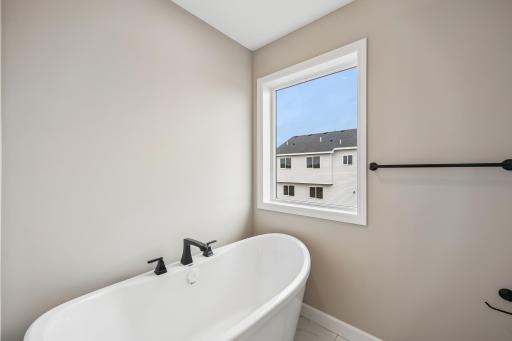 Enjoy relaxing and unwinding in the private free standing tub!
