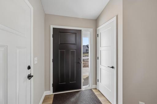 Convenient access from garage and front door complete with a coat closet in the foyer.