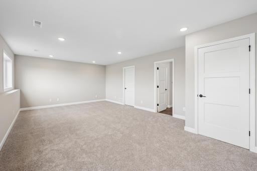 Spacious lower level - imagine a cozy couch and family movie nights, hosting game days, you name it - this space can do it!