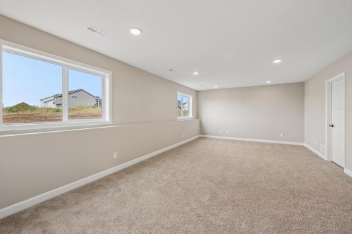 Lower level complete with look out windows providing lots of natural light.