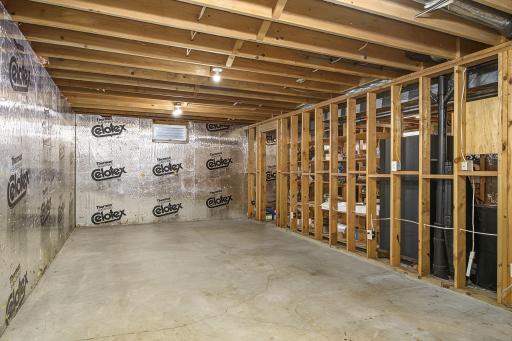 The sparkling clean unfinished lower level awaits your design, future finish, and equity.
