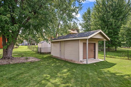 The, 19X10, storage shed you have always wanted complete with a concrete floor, garage style door, plus a convenient side entrance door.
