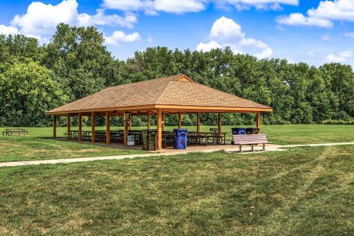 A covered pavilion for large gatherings and individual picnic tables throughout the park for small gatherings.