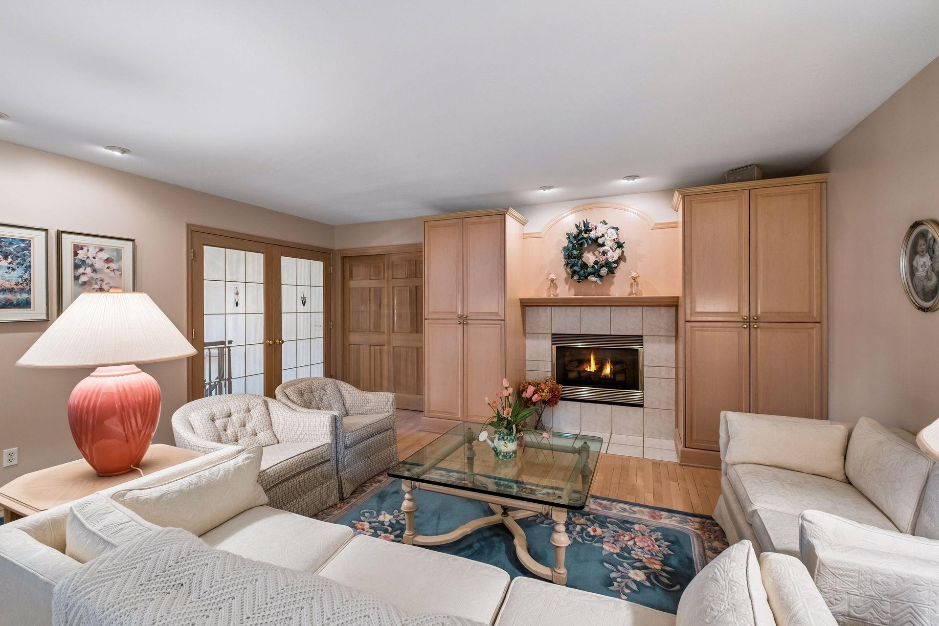 Upper level main living area with fireplace.