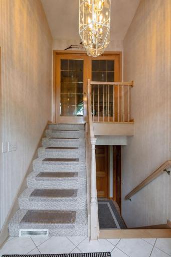 The split entrance to the upper and lower level with garage entrance just to the left.