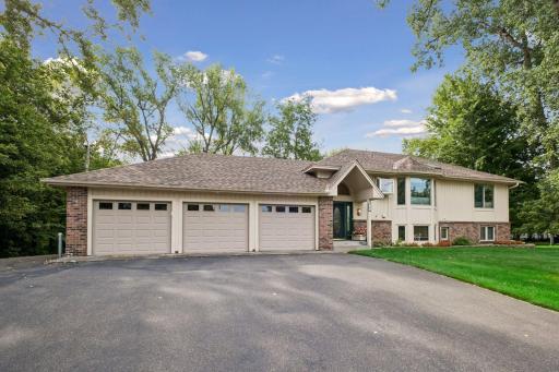 Welcome to 7 Kaiser ave! this stunning up down duplex offers a three car garage with lake views and a spacious backyard and patio.