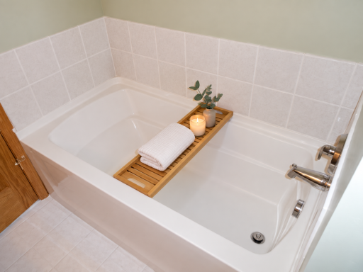 Tub in lower level bath (virtually staged).