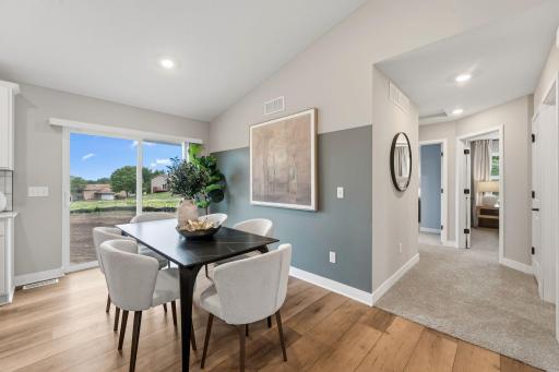 Residents can migrate from casual bar-style seating to the formal dining table