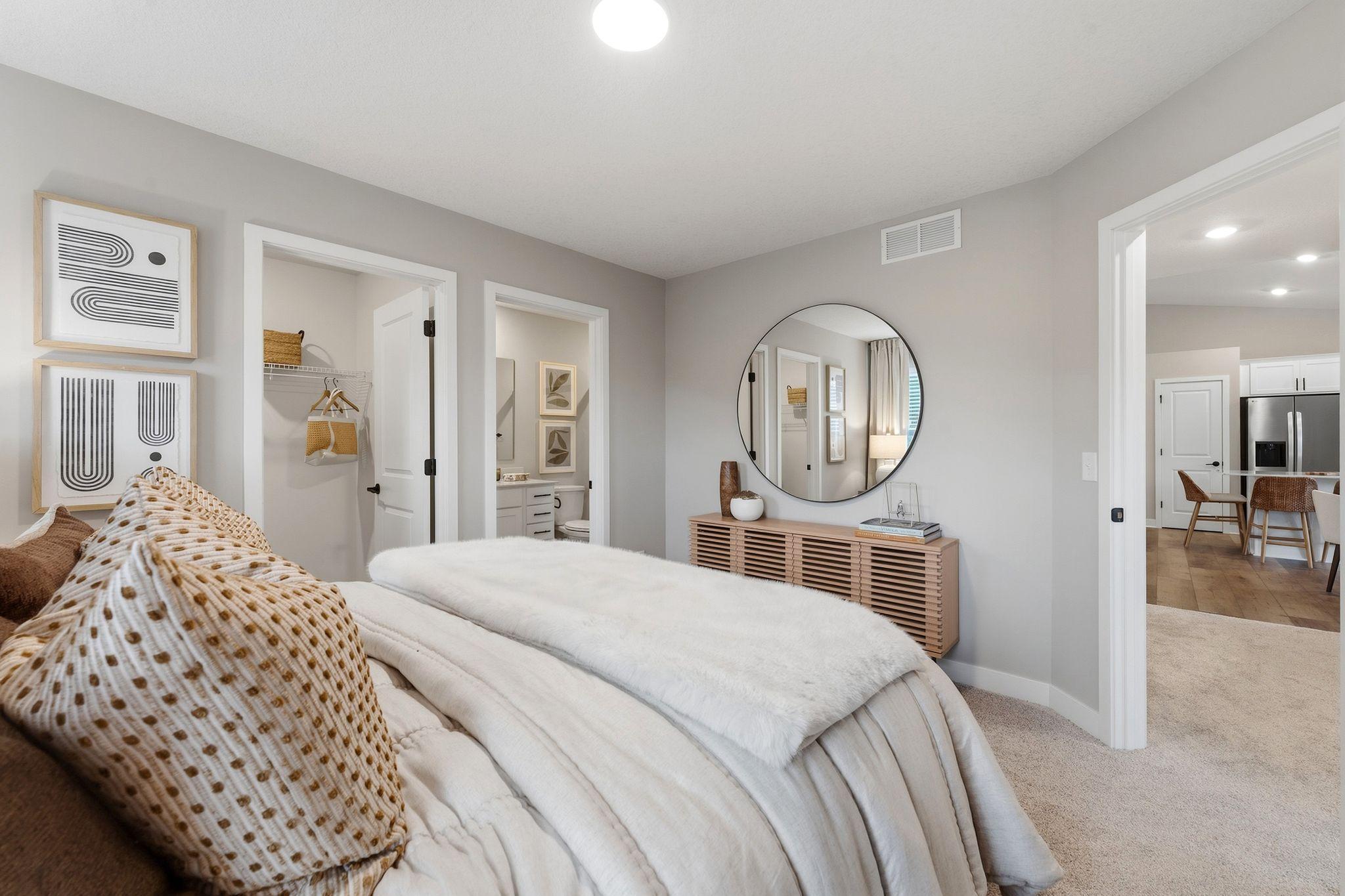 The owner’s suite combines comfort and style with ease
