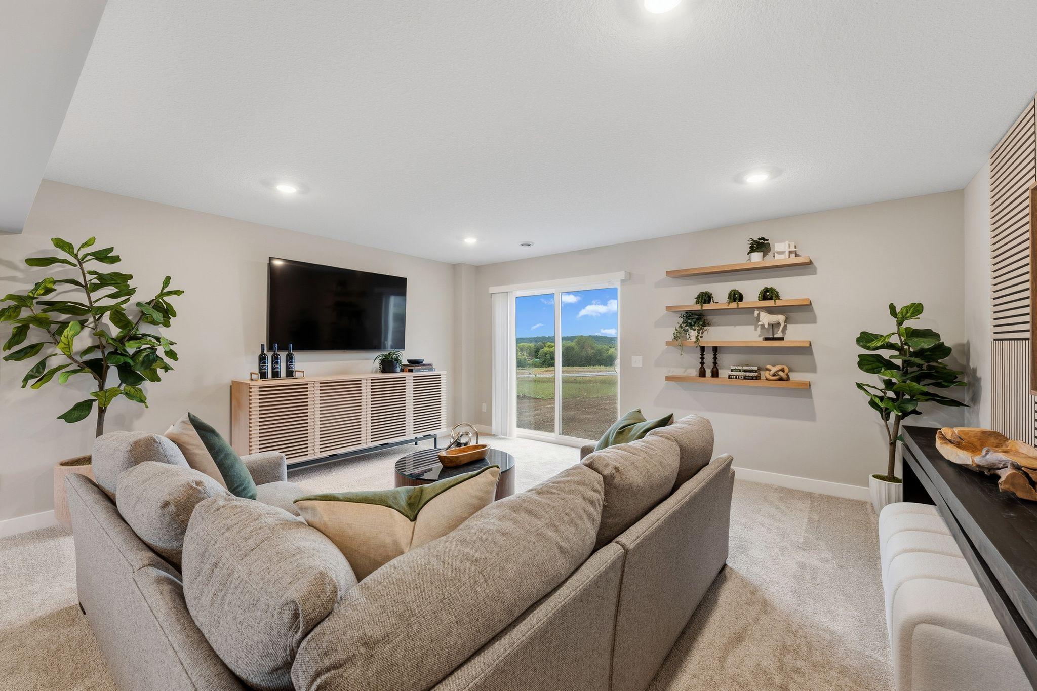 Versatile in nature, the recreation room can easily accommodate a home office set-up