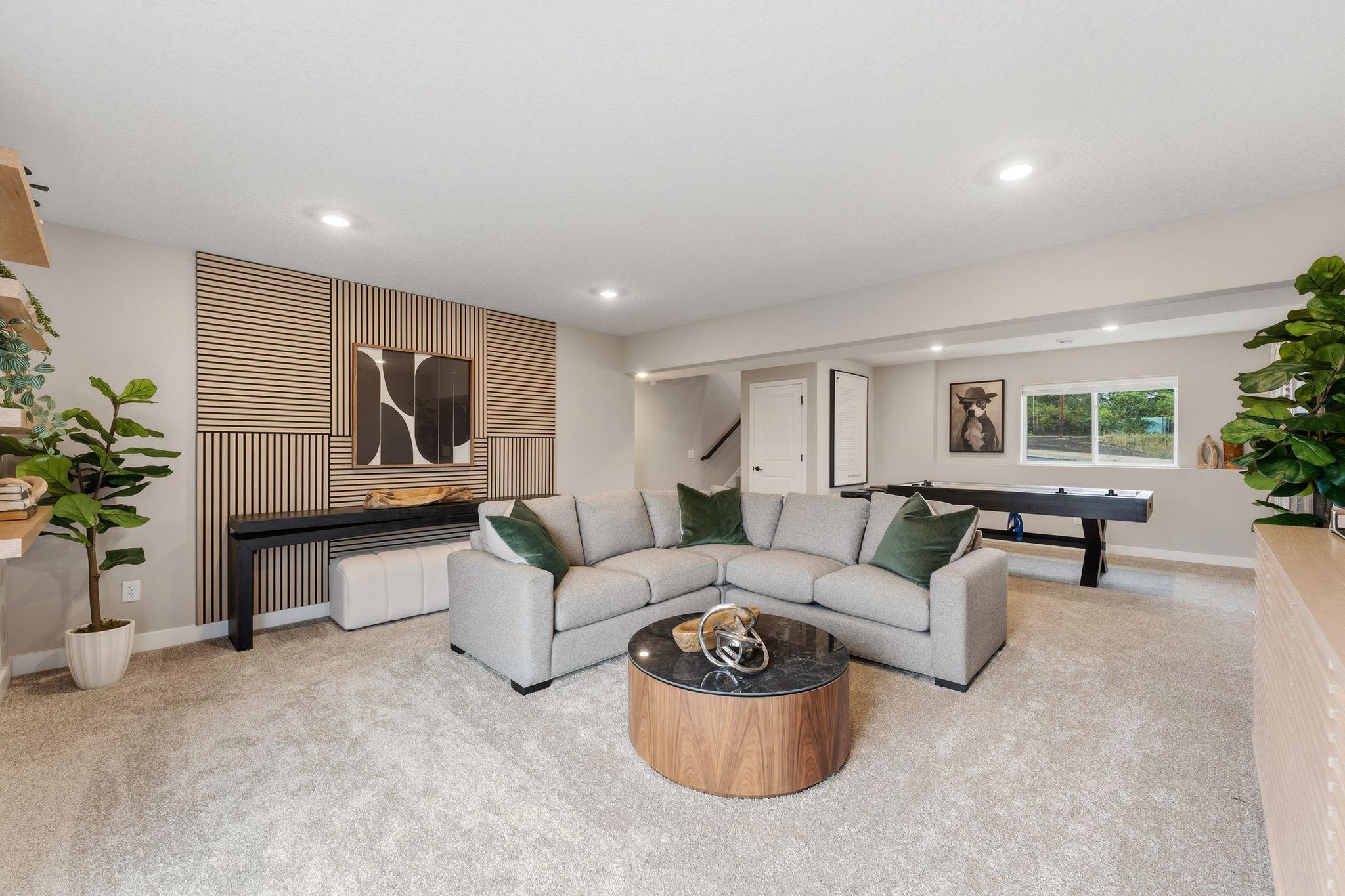 Homeowners seeking additional living space can choose the option of a finished basement. Custom add-ons include a recreation room, third bathroom and bedrooms four and five.