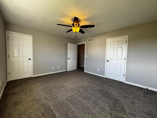 Upper-level primary bedroom