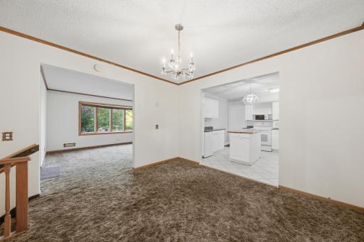 The most popular room in the house - the dining room right next to the kitchen! Perfect for large gatherings and everyone getting in on the conversation.