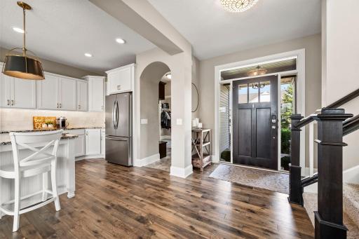 Open kitchen design keeps the chef connected to the dining and living spaces.
