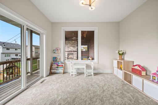 Flexible main-level room works beautifully as an office, study, or play space. Brand-new carpet and abundant natural light create a comfortable work-from-home space.