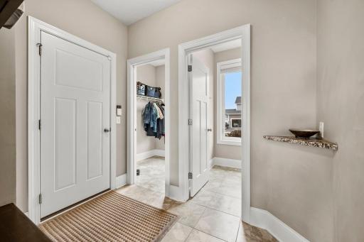Mud Room connects the Garage, Coat closet and Walk-in Pantry