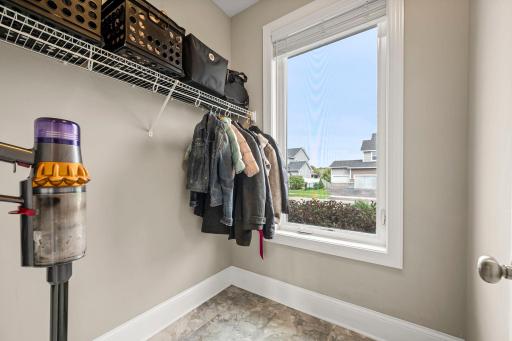 Spacious Coat closet and drop-zone connects to the mudroom off the garage, functionality help keep everyday essentials organized.