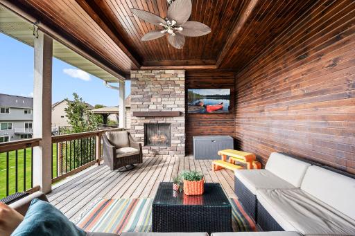 Warm tongue-and-groove walls and ceiling give the outdoor living space a custom-finished feel.