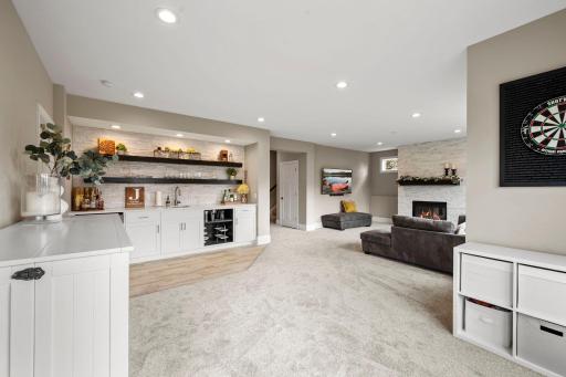 Beautiful walk-up bar makes the lower level ready for entertaining.