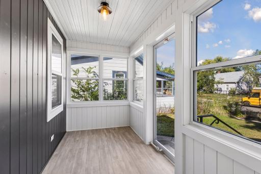 Step into the updated front porch with new windows and flooring